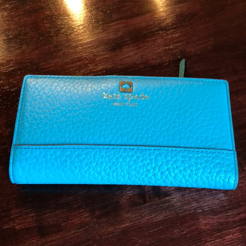 Kate Spade turquoise wallet.